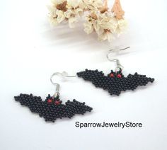 "Stylish earrings for Halloween, Seed bead bat earrings These bat earrings for Halloween are specially made for you to emphasize your style for the holiday. They emphasize your style and help you stand out from everyone else. This earrings is made from the high-quality Czech bead, with the use of sterling silver furnice, with a bright bat pattern. This bat earrings can carry every girls and woman of any age, harmonizes with any clothes. Earrings details: Length: Dangle earrings measure 1.2\" fro Bat Seed Bead Earrings, Black Beaded Dangle Earrings For Halloween, Black Dangle Beaded Earrings For Halloween, Halloween Seed Bead Earrings, Halloween Seed Bead, Beaded Bat, Gothic Items, Halloween Beaded Jewelry, Earrings Handmade Beaded