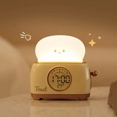 an alarm clock with a face on it