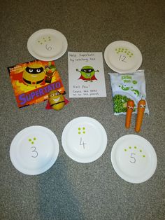 some paper plates with numbers on them and other items to make it look like they are in the movie despicables