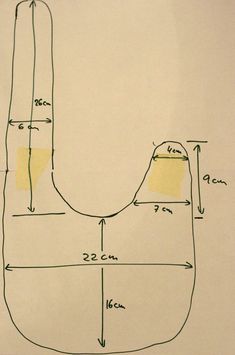 a drawing of a handbag is shown with measurements