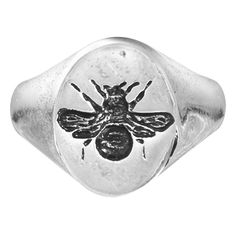 a silver ring with a bee on it