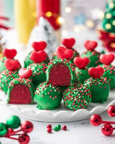 Festive No-Bake Grinch Balls 🎄💚 Add some holiday whimsy with these Grinch-themed truffles! 💚 Delicious red velvet flavor wrapped in green chocolate with a heart - just like the Grinch's own transformation. Perfect for Christmas gatherings! 🎅💚✨ Ingredients: - 1 box red velvet cake mix (baked as per instructions) - 8 oz cream cheese, softened - 16 oz green candy melts - 1/2 cup white chocolate, melted (for drizzle) - Heart-shaped candies (for decoration) Instructions: 1. Prepare the Mixtur... Grinch Balls, Box Red Velvet Cake, Red Velvet Flavor, Red Velvet Cake Mix, Green Candy, Christmas Gathering, 2023 Christmas, Candy Melts, Red Velvet Cake