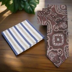 This silk necktie, featuring shades of brown with a detailed paisley pattern, is a refined and versatile accessory that adds a touch of classic charm to any ensemble. The intricate paisley design, rich in texture and depth, showcases a blend of tradition and elegance, making it a standout piece in both professional and social settings. Dress Shirts: Cream Dress Shirt: A cream-colored shirt complements the warm tones of the brown paisley tie, creating a harmonious and sophisticated look. This pai Cream Dress Shirt, Cream Shirt Dress, Brown Bow Tie, Grey Bow Tie, Yellow Bow Tie, Light Blue Dress Shirt, Purple Bow Tie, Polka Dot Bow Tie, Paisley Color