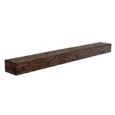 a large wooden shelf sitting on top of a white wall