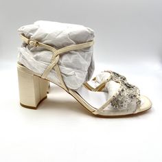 Badgley Mischka Women's Blaine Satin Dress Sandal Heels. Colorway Is Ivory. Women's Size 10 Regular / Medium Width. Condition: New In Box; Box Has Wear. New To Poshmark? Sign Up Using Invite Code: Tentoday For $10 Off Your Purchase! A Satin And Mesh Sparkle Overlay And An Open Toe Ensure Your Feet Can Breathe While Basking In Glamour. The Ankle Strap Adds An Extra Note Of Femininity, While Providing Stability. This Style Is Subtle And Versatile, For The Garden Party Of The Season, Black Tie Even Elegant Embellished Sandals With Block Heel, Elegant Embellished Block Heel Sandals, Elegant Beige Sandals For Evening, Elegant Wedding Sandals With Wrapped Heel, Elegant Cream Sandals With Wrapped Heel, White Embellished Sandals For Formal Occasions, Glamorous Cream Heels For Evening, Elegant Embellished White Sandals, Formal White Embellished Sandals