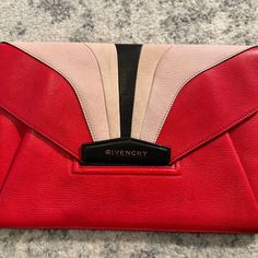 11" W X 8" H Well Loved 2015 Givenchy Antigona Clutch. Some Markings And Spots On Both Front And Back Of Bag Visible In The Pictures. Inside In Excellent Condition. Purchased At Intermix In 2015 Chic Red Clutch With Top Handle, Chic Red Top Handle Clutch, Chic Red Crossbody Clutch, Designer Envelope Evening Bag, Designer Evening Envelope Bag, Chic Red Clutch With Detachable Handle, Luxury Red Rectangular Clutch, Red Top Handle Clutch For Formal Occasions, Formal Red Clutch With Top Handle