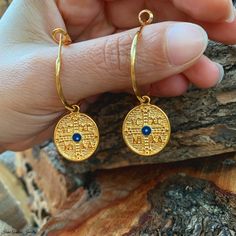 Greek Konstantino Earrings with Blue Evil Eyes Women deserve to be stylish, that's why this time I chose to create a unique pair of greek Konstantino Earrings with evil eyes for them! I chose to combine gold plated hoops with gold plated konstantino charms! These religious earrings can be worn from morning till night, with every outfit! In Irene Andrea Jewelry store, you will find more designs of handmade earrings! -Gold Plated Konstantino Charms (18.2*23.4 mm) -Blue Evil Eye Charms -Gold Plated Christian Earrings, Greek Earrings, Byzantine Earrings, Byzantine Jewelry, Greek Evil Eye, Greek Coins, Evil Eye Earrings, Coin Earrings, Greek Jewelry