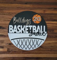 there is a sign that says bulldog's basketball dance on the wall in front of it