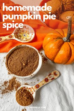 homemade pumpkin pie spice in small bowls with spoons