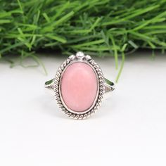 "Pink Opal Ring, Sterling Silver Opal Ring, Natural Peruvian Pink Opal Gemstone Handmade Ring, Opal Ring, Birthstone Ring, Women's Ring. Pink Opal Ring, is a true gem in our collection. Handcrafted with love, this stunning piece features a Sterling Silver Opal Ring adorned with a natural Peruvian Pink Opal gemstone. Known for its captivating color and ethereal beauty, the Pink Opal brings a touch of elegance to any ensemble. Whether you love opals or are seeking a beautiful birthstone ring, this Women's Ring is the perfect choice. Add a touch of sophistication and charm to your jewelry collection with this truly unique and handmade Opal Ring. F E A T U R E S * Item: Handmade Design Peruvian Pink Opal Ring (31745-05) * Handmade Artisan Jewelry  * High-Quality Solid 925 Sterling Silver. * Pl Spiritual Crystal Ring With Stone Setting, Spiritual Stone Setting Crystal Ring, Opal Ring With Large Stone As A Gift, Pink Opal Ring, Sterling Silver Opal Ring, Ring Opal, Ring Birthstone, Gemstone Jewelry Handmade, Women Ring