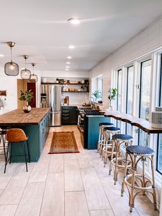 the kitchen is clean and ready to be used as a dining room or living room