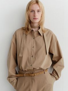 Composition : cotton 75% nylon 25%Color : BrownCountry of Origin : Republic of Korea Brown Cotton Shirt For Work, Brown Spread Collar Tops For Work, Brown Relaxed Fit Shirt For Work, Casual Brown Cotton Blouse For Fall, Brown Cotton Workwear Blouse, Brown Cotton Blouse For Work, Khaki Collared Cotton Blouse, Khaki Cotton Collared Blouse, Collared Cotton Blouse In Khaki