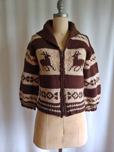 "A very rare 40s handknit wool cardigan with a reindeer motif Dark cocoa brown and ecru with hints of orange Shawl collar Metal zipper Not a heavy weight sweater Wider sleeves Handknit Bust - 34\" Hem - 34\" Sleeves - 15 1/2\" Cuff of sleeve across - 5\" Length - 21\" from back of collar to hem Excellent vintage condition Fresh and clean, ready to wear" Rustic Brown Winter Outerwear, Vintage Brown Cardigan For Winter, Vintage Brown Winter Cardigan, Vintage Brown Sweater With Fair Isle Pattern, Brown Fair Isle Pattern Winter Cardigan, Fitted Brown Cardigan For Cold Weather, Vintage Knitted Brown Outerwear, Nordic Style Brown Cardigan For Fall, Warm Brown Wool Sweater