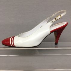 "1980s 8 White Leather Sling back Spectators w Red Lizard embossed accent on Leather Tag/Label: Saks 5th Avenue Size Label: 8 AA Upper Material: Genuine Leather Sole: Genuine Leather - Pointy Toe pumps - gold tone speed buckle ✂------ M E A S U R E M E N T S ------- Best Fit: US 8, EU 38, UK 6 Insole Length: 10\" Ball Width: 3\" Heel Height: 3 1/4\" Please compare these measurements with a pair of your own shoes in a similar style to ensure a proper fit. If you need more information, please ask Luxury Pointed Toe Slingback Pumps With Red Sole, Luxury Pointed Toe Court Shoes With Red Sole, Luxury Red Slingback Pumps With 4-inch Heel, Luxury Red Slingback Pumps With Leather Sole, Luxury Red Slingback Pumps With Red Sole, Luxury White Leather Sole Slingback Pumps, Classic Red Luxury Slingback Pumps, Luxury Slingback Pumps With Red Sole, Luxury White Slingback Pumps With Contrasting Heel Counter