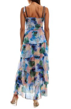 A smocked bodice adds just the right amount of structure to an airy maxi dress in an artistic floral pattern. 50" center front length (size M) Slips on over head Square neck Adjustable tie straps Lined skirt 100% polyester Machine wash, line dry Imported Multicolor Midi Maxi Dress With Smocked Bodice, Blue Smocked Tiered Skirt Dress For Summer, Breezy Ruched Maxi Dress For Spring, Flowy Multicolor Smocked Dress For Spring, Blue Tiered Skirt Smocked Dress For Summer, Strapless Maxi Dress With Smocked Bodice For Spring, Pink Smocked Maxi Dress For Spring, Multicolor Maxi Dress With Smocked Back For Garden Party, Multicolor Tiered Maxi Dress With Smocked Bodice