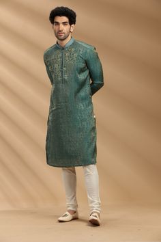 Green Jacquard Silk Kurta Set Traditional  Wear  Care Instructions: Dry Clean Chanderi Slik Fabric with Touch of Stitch Line  Top Details: Color- Bronze Yellow, Fabric - Jacquard slik Bottom Details Color - Cream, Style - free size Chudidar, Fabric -Dhupion Silk Package Include: Kurta and Pajama Additional Information : - As this Sherwani/Waistcoat/Kurta is stitched & made as per orders requested only, So there is NO RETURN & NO EXCHANGE on this product. Kindly Choose your Fit Size and Place you Silk Kurta Set, Kurta Set For Men, Silk Kurta, Stitch Lines, Color Bronze, Cream Style, Traditional Wear, Yellow Fabric, Kurta Set