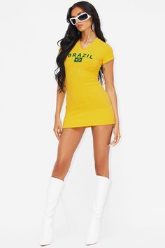 Available In Yellow. Mini T-Shirt Dress V-neck Short sleeves Stretch Front graphic Contrast trim Length = 33" Disclaimer: Due To The Printing Process A Difference In Saturation May Occur. Each Garment Is Unique. 95% Cotton 5% Spandex Imported | Brazil Babe Mini TShirt Dress in Yellow size Large by Fashion Nova Yellow Fashion, Matching Dresses, Contrast Trim, Yellow Dress, Active Wear For Women, T Shirt Dress, Printing Process, Clothes For Sale, Tshirt Dress