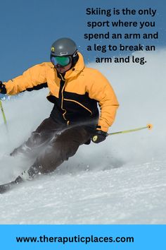 a man riding skis down the side of a snow covered slope with words on it