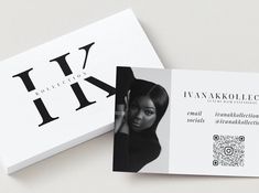 two business cards on top of each other with the letter h in black and white