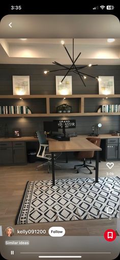 a home office with black and white decor