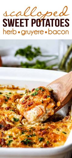 a white casserole dish with meat and vegetables in it is being scooped from the casserole