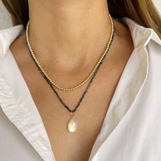 Meet your new everyday essential, The Lynda Necklace. Let it stand out on its own or layer with a tiny gemstone necklace or classic, pattern chain. - Necklace is strung on silk, length is 16 inches with a 1 inch extender - all pieces are 14K Gold Filled and sterling silver, for more information on our metals click HERE! Recommended Care: To maintain the integrity of your beautiful new silk strung or knotted jewelry, avoid exposure to wet or moist conditions. Take your jewelry off when you shower Minimalist Everyday Necklace With Gemstone Beads, Gold Crystal Necklaces With Round Beads For Everyday, Elegant Gold Charm Necklaces With Gemstone Beads, Gold Gemstone Beaded Necklaces For Layering, Gold Faceted Necklaces For Layering, Everyday Gold Necklaces With Gemstone Beads, Minimalist Single Strand Necklaces For Layering, Elegant 14k Gold-filled Gemstone Beads Necklace, Gold Teardrop Pendant Necklace For Layering