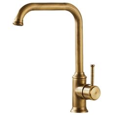 an antique brass faucet on a white background