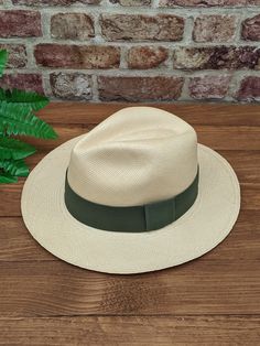 Handmade Panama Hat and Removeable ~ Olive Green ~ Accessory Band The band is interchangeable and can be removed to reveal a plain dark band underneath (dark band fixed to hat). The removeable band is elasticated and will stretch for different size hats. Create different looks for your hat by adding different colour bands. You can find more in our shop: https://www.etsy.com/shop/personalisedpanamas/?etsrc=sdt&section_id=44636577 ~ Genuine Panama hat handwoven with Toquilla palm ~ ~ Handwoven in Green Accessories, Classic Hats, Color Bands, Quality Hats, Easy Travel, Plain Black, Made Goods, Hat Sizes, Ecuador