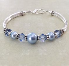 Cheap Blue Elegant Pearl Bracelet, Cheap Blue Pearl Bracelets, Elegant Bangle Bracelets For Bridesmaid Gift, Dainty Blue Bracelets For Wedding, Elegant Bangle Jewelry For Bridesmaid Gift, Delicate Silver Bracelets For Bridesmaids, Elegant Bangle For Bridesmaid Gift, Delicate Silver Bracelet For Bridesmaid, Nickel-free Elegant Wedding Bracelets