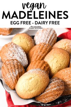 vegan maddelines on a plate with powdered sugar in the middle and text overlay