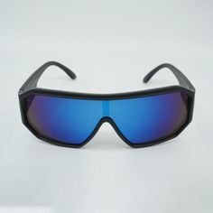 Style: S2958 Shape: Shield Protection: UV400 Lens Material: Plastic Eye/Bridge/Temple: 65/20/120 (mm) Memphis Futuristic Shield Sunglasses - S2958 Actual colors may vary. This is due to the fact that every computer monitor has a different capability to display colors and that everyone sees these colors differently. We try to edit our photos to show the samples as life-like as possible, but please understand the actual color may vary slightly from your monitor. We cannot guarantee that the color Futuristic Shield, Edgy Sunglasses, Holographic Black, Oversized Round Sunglasses, Shady Lady, Blue Lens, Ladies Gents, Frame Blue, Shield Sunglasses