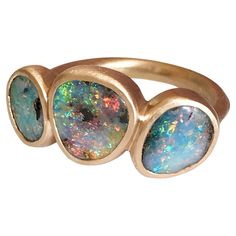 Dalben design One of a kind 18 kt rose gold ring with three bezel-set blue-green-pink Australian Boulder Opals weight 4,34 carats . Ring size US 7 1/4 - EU 55 re-sizable . Bezels setting dimension: max width 23 mm, max height 10, mm. The ring has been designed and handcrafted in our atelier in Italy Como with a rigorous quality workmanship . Opal Rose Gold Ring, Italy Como, Rose Gold Opal Ring, Boulder Opal Ring, Australian Boulder Opal, Boulder Opal, Opal Rings, Cocktail Rings, Bezel Setting