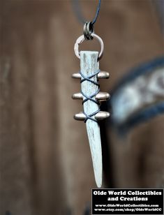 **Free Shipping to the U.S.** Representing the Neo Tribal Hunter Gatherer.... This unique one of a kind hand crafted pendant is made from a deer antler and .25 caliber copper jacketed bullets. It's hung on a 1.5mm black waxed cotton cord. Decorative cotton cord also is wrapped between the bullets. The antler is double hung by 2 copper rings with hand hammered joints and 2 smaller brass rings. For those who appreciate the act of repurposing, the antlers and bullets were acquired at an estate auct Antler Projects, Antler Crafts, Bullet Shell, Earring Inspiration, Bullet Necklace, Hunter Gatherer, Brass Rings, Bone Horn, A Deer