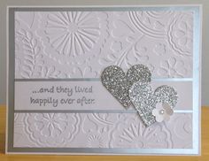 a card with two hearts on it and the words, and they lived happily ever after