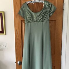 Never Worn Gown In Light Green With Satin Top And Florets In Back. Back Zipper. Capped Sleeves. 100% Polyester. Green Fitted Short Sleeve Gown, Green Fitted Gown With Short Sleeves, Fitted Short Sleeve Bridesmaid Gown, Jordan Green, Jordan Dress, Back Back, Womens Jordans, Capped Sleeves, Satin Top