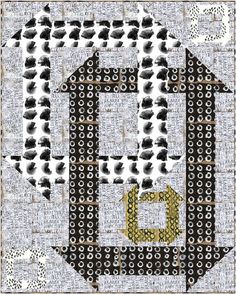 the letter b is made up of black and white circles, with gold letters on it