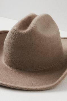 So chic western-inspired hat featured in a classic cowboy shaped silhouette with a cattleman crease crown, upturned brim, and interior ribbon adjuster for a so-perfect-fit. * Interior sweatband * Adjustable fit * Structured style | Cash Cowboy Hat by Wyeth at Free People in Tan Classic Fedora Felt Hat For Rodeo, Fitted Fedora For Fall Western-themed Events, Western Riding Hats For Winter, Curved Brim Fur Felt Fedora For Ranch, Western Style Fur Felt Hat For Rodeo, Fitted Fedora Hat For Ranch, Kentucky Derby Ranch Felt Hat With Curved Brim, Fitted Fedora For Ranch, Western Fur Felt Fedora With Curved Brim