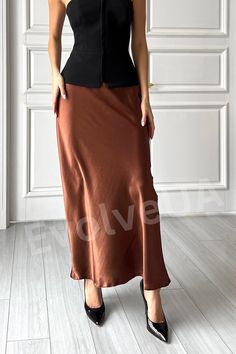 Stylish, elegant and modest satin maxi skirt  Made of high quality satin  - elegant and classy - skirt length is 37,7 inches or 96 cm  SIZES 4 sizes XS = 2 US numeric WAIST 24 inches or 63 cm HIPS 36 inches or 92 cm S = 4 US numeric WAIST 26 inches or 67cm HIPS 37 inches or 96cm M = 6 US numeric WAIST 28 inches or 71cm HIPS 39 inches or 100cm L= 8 US numeric WAIST 29 inches or 75cm HIPS 40 inches or 104cm     MATERIAL Italian satin (silk and polyester blend)    SHIPPING Standard shipping is FREE to some countries If you want to have express shipping, please, upgrade while checking out.   QUESTIONS If you hesitate or want to make sure the skirt fits you, write me a message, I'll gladly help you. Formal Full-length Silk Maxi Skirt, Satin Floor-length Maxi Skirt, Luxury Satin Floor-length Skirt, Brown Satin Maxi Skirt, Luxury Satin Finish Maxi Skirt, Brown Maxi Skirts, Classy Skirts, Satin Maxi Skirt, Maxi Skirts