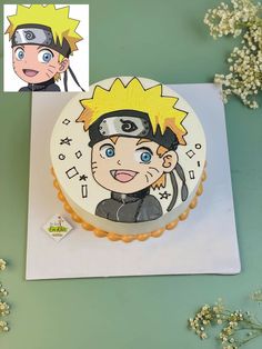 a birthday cake with an image of naruto on it and flowers in the background