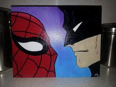 a painting of spiderman and batman on a canvas