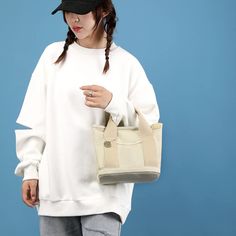 〖Simple Japanese style〗 The plain canvas material is matched with a retro version, with a strong Japanese style, which can be used as a daily bag with various clothes, simple and versatile 〖Daily Size〗The size is 9*8.3*6in, which can accommodate daily items such as A4 books, MINI tablets, mobile phones, small cosmetic bags, wallets, etc. Hardware zipper, smooth opening and closing, regular stitching 〖Fine workmanship〗 This hobo handbag is made of thick and durable high-density canvas, which is w Diy Clothes Bag, Branded Shopping Bags, Bucket Tote Bag, Plain Canvas, Mummy Bag, Knitting Tote Bag, Italian Leather Bags, Small Cosmetic Bags, Daily Bag