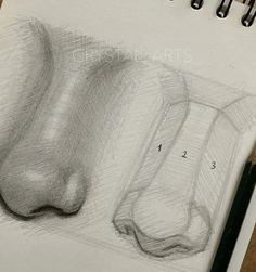 a pencil drawing of two shoes on top of a sheet of paper