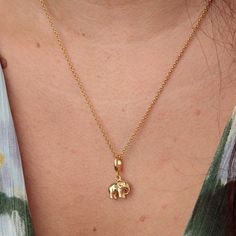 This gold elephant charm necklace makes the perfect gift for that loyal someone who has patience, strength and wisdom, not to mention an amazing memory. Whether this person is you mum, your girlfriend or your best friend, this elephant charm is bound to provide another great memory.  All our charms attach with a clip-on clasp and are compatible with all other leading charm jewellery brands. Simply clip-on or slide-on to a chain, charm bracelet or charm carrier necklace.  All Lily Charmed jewelle Everyday Spiritual Yellow Gold Charm Necklace, Spiritual Yellow Gold Charm Necklace For Her, Elephant Necklace Gold, Elephant Charm Necklace, Chain Charm Bracelet, Gold Elephant, Elephant Necklace, Gold Jewelry Necklace, Elephant Charm