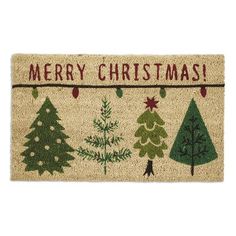 a merry christmas door mat with trees on it