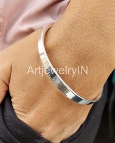 925 Sterling Silver Bangles, Silver Bead Bangle, Silver Bangles, Men's Bracelet, Unisex Bracelet, Adjustable Silver Bangle Handmade Jewelry Handmade item Materials: Silver Adjustable : No Style: Bangle Bracelet Size Inches Circumference/Diameter 7 / 2.23 7.5 / 2.39 8 / 2.55 8.5 / 2.71 9 / 2.87 9.5 / 3 Elegant, , minimal and shiny ! A lovely basic to have in your wardrobe and wear anytime  O T H E R ∙ I N F O R M A T I O N * All items are nicely packaged ready to gift in elegant jewelry boxes. Pl Silver Bracelets For Gifts, Silver Bracelets With Simple Design For Gift, Silver Bracelets Simple Design Gift, Sterling Silver Bangle Bracelet With Simple Design, Silver Beads Cuff Bracelet Bangle As Gift, Silver Beaded Bangle Cuff Bracelet As Gift, Silver Sterling Bracelet Simple Design Gift, Sterling Silver Bracelet Simple Design Gift, Silver Beads Bangle Cuff Bracelet For Gift