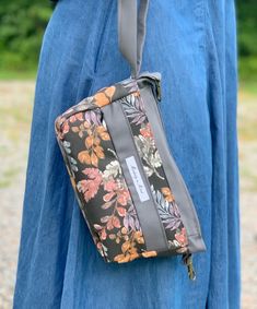 "This handmade zippered pouch can be used for carrying your phone, purse essentials, receipts, hair accessories, makeup- you name it! Do you need a lightweight crossbody purse? It can be that, too! Approximately measuring 8\"x5\"x1\", MnM's Casual Wristlet is large enough for carrying essentials & features an outside zippered pocket, as well as an inside divided pocket on one side & a snap pocket on the other.  You'll also find a hook at either end of the wristlet that can remain as inside key h Bible Bag, How To Make Skirt, Purse Essentials, Zippered Bag, Phone Wristlet, Custom Made Clothing, Small Crossbody Purse, Purse For Women, Wristlet Purse