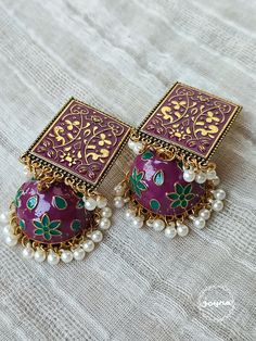 This intricate pair of earrings can be styled with a variety of outfits. They are durable and classy. They can be the highlight of your look.  N.B. The color can slightly differ from the given photos due to lighting. Elegant Jhumkas For Festive Occasions, Bohemian Kundan Jhumkas For Festive Season, Festive Bohemian Kundan Jhumkas, Bohemian Tilla Jhumkas For Festive Occasions, Bohemian Bridal Earrings With Latkans For Festive, Festive Bohemian Bridal Earrings With Latkans, Bohemian Heavy Jhumkas For Wedding, Bollywood Style Jhumkas For Festivals, Bohemian Jhumkas With Intricate Design For Festive Occasions