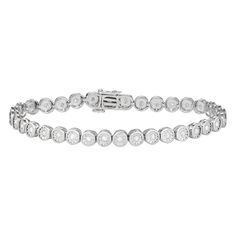 "Made from diamond accents set in miracle plates, this sterling silver bracelet lends a touch of sparkle to your attire. Made from diamond accents set in miracle plates, this sterling silver bracelet lends a touch of sparkle to your attire. Bracelet length: 7.25 in. Packaging: boxed Base material: sterling silver Plating: rhodium Finish: polished Nickel freeSTONE DETAILS Total weight: 1/2 ct. Setting: prong Color grade: H-I Clarity: I1-I2 Gemstones may have been treated to enhance their appearan White Gold Sterling Silver Tennis Bracelet With Diamond Accents, Anniversary White Gold Channel Set Diamond Bracelet, Classic Silver Channel Set Diamond Bracelet, Sterling Silver Diamond Bracelet With Round Cut, Anniversary Diamond Bracelet Channel Set, Anniversary Sterling Silver White Gold Tennis Bracelet, Classic Silver Tennis Bracelet With Channel Set, White Gold Channel Set Tennis Bracelet For Anniversary, White Gold Channel Set Diamond Bracelet