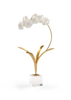 a white and gold vase with flowers in it on a white background, the vase is shaped like an orchid