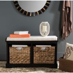 a white bench with wicker baskets under a mirror